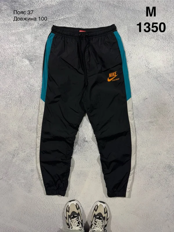 Nike спортивні штани чорні з бірюзовими вставками - black, розмір M