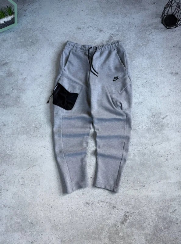 Nike Tech Fleece штани сірі з нейлоновою кишенею - розмір S