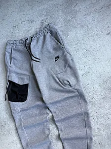 Nike Tech Fleece штани сірі з нейлоновою кишенею - розмір S - фото 2