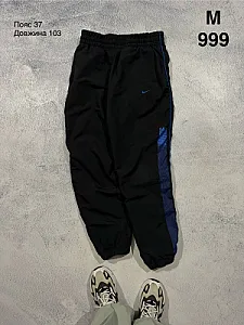 Nike спортивні штани чорні з синіми деталями - розмір M - фото 1