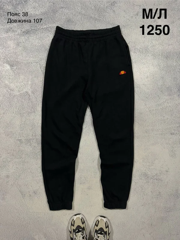 Ellesse спортивні штани чорні - розмір M