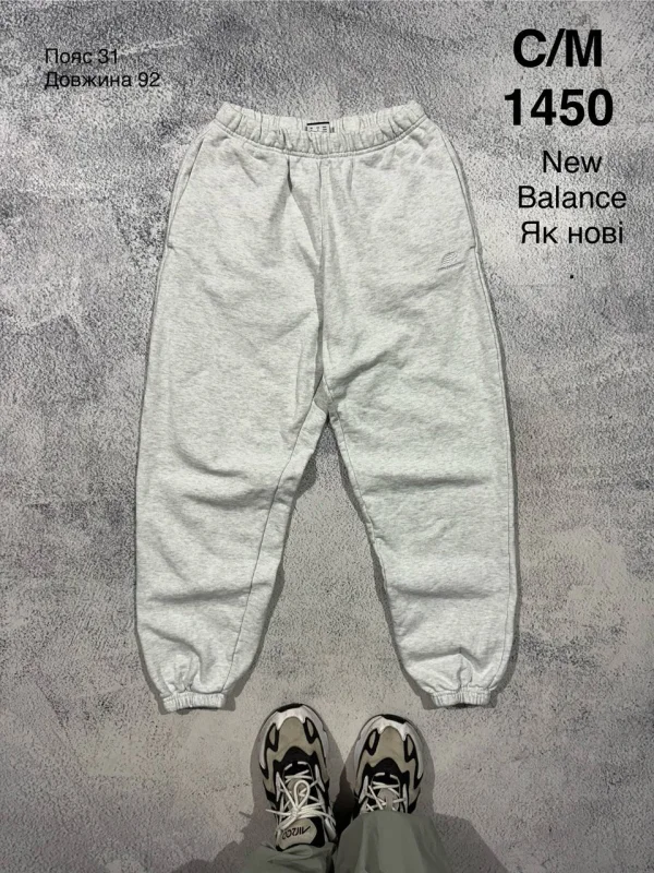 New Balance спортивні штани світло-сірі - розмір S