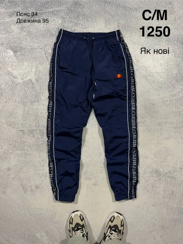 Ellesse спортивні штани темно-сині - розмір S