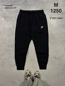 Nike утеплені спортивні штани чорні - розмір M - фото 1