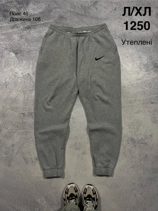 Nike утеплені спортивні штани сірі - розмір L