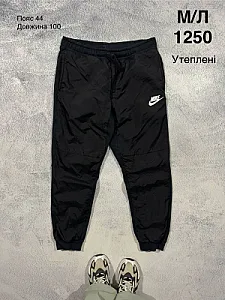 Nike утеплені спортивні штани чорні - розмір M - фото 1
