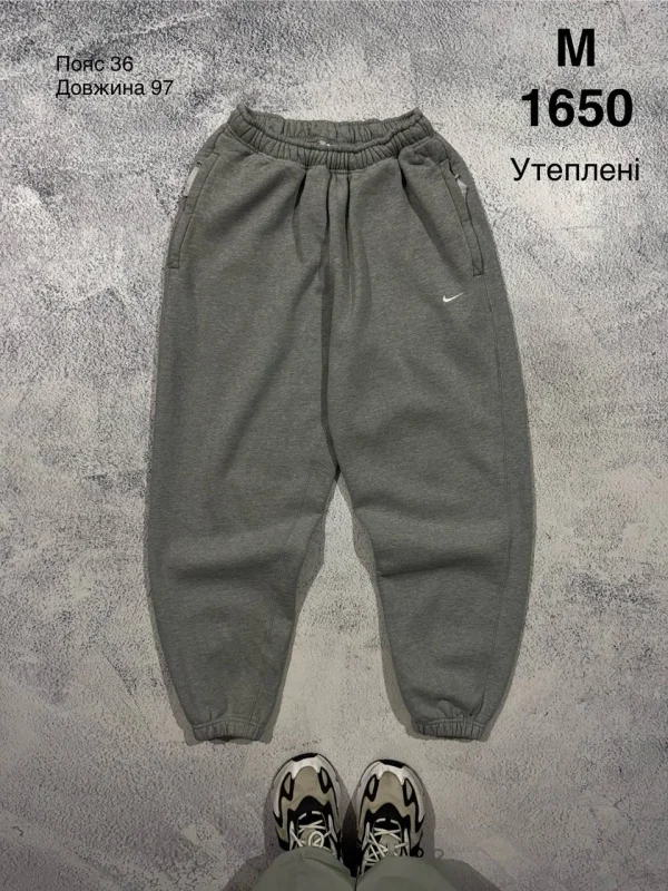 Nike спортивні штани сірі - розмір M