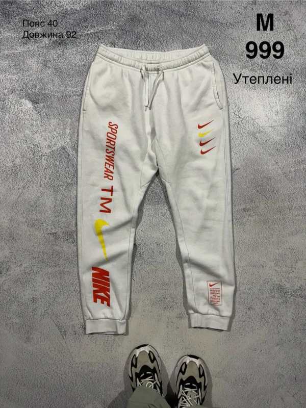 Nike утеплені спортивні штани білі - розмір M