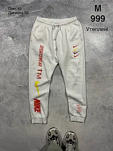 Nike утеплені спортивні штани білі - розмір M - фото 1