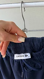 Lacoste штани темно-сині - розмір L - фото 7